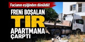 Freni boşalan kamyon apartmana çarptı